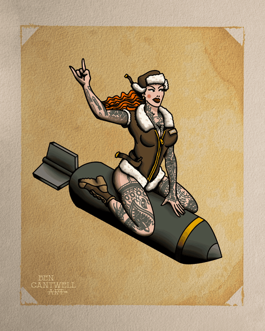 Colorful print of a pin-up girl sitting on a bomb, created by Ben Cantwell Art, showcasing vintage-style artwork.
