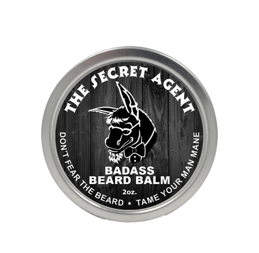 Badass Beard Care Secret Agent beard balm in a jar, showcasing the grooming product with the label visible.