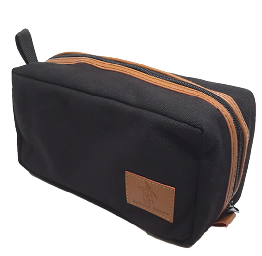 Badass Beard Care men's canvas travel bag with zipper closure, compact and sturdy for grooming essentials and travel organization.