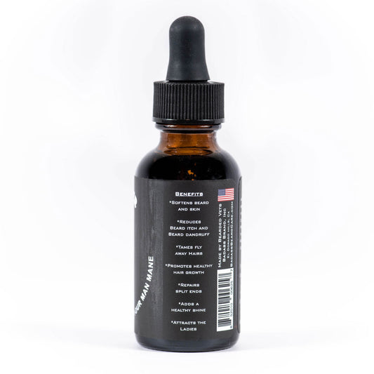 Badass Beard Care Secret Agent Beard Oil bottle with label, natural light highlighting the sleek packaging and oil inside.