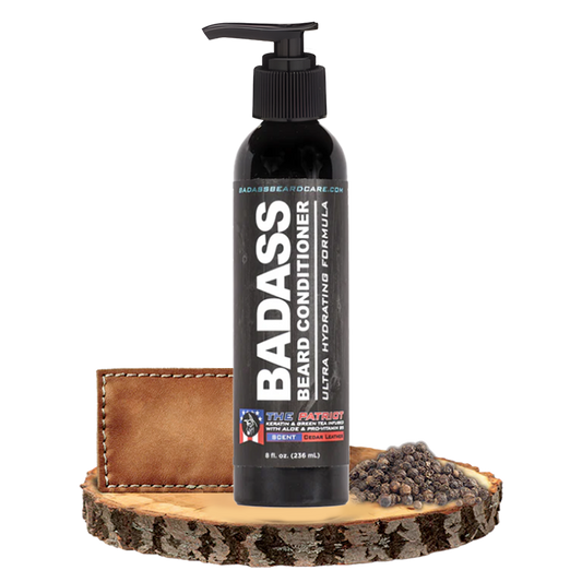 Badass Beard Care The Patriot beard conditioner tube with black cap and label, designed for nourishing and softening facial hair.