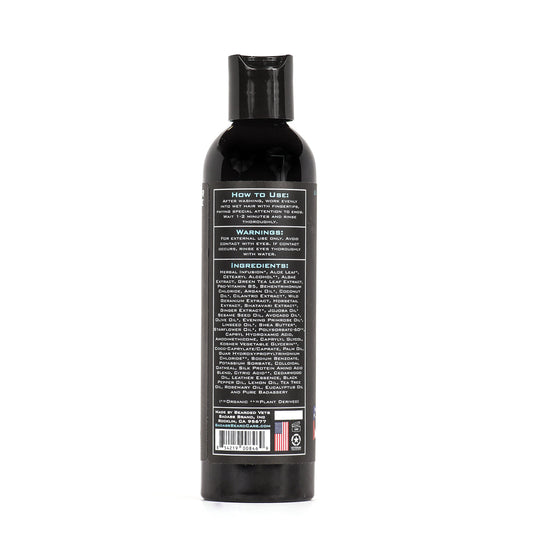 Badass Beard Care Patriot Beard Conditioner bottle with label, designed for nourishing and softening men's beard hair.