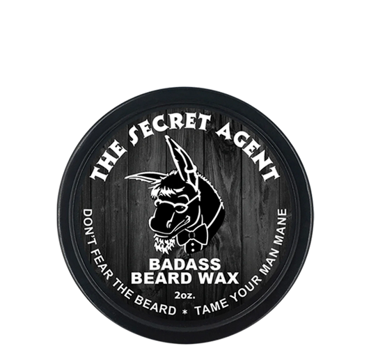 Container of Badass Beard Care Secret Agent Beard Wax, a natural beard styling wax with a sleek black and gold label.
