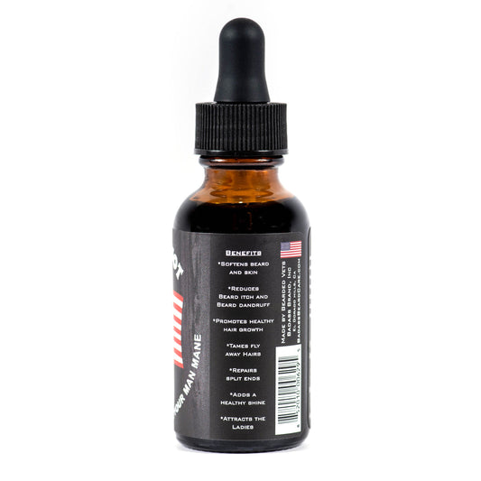 Badass Beard Care The Patriot beard oil bottle with label, designed for moisturizing and conditioning men's beards.